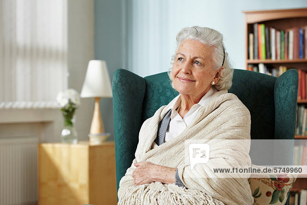 Senior woman wrapped in shawl  portrait