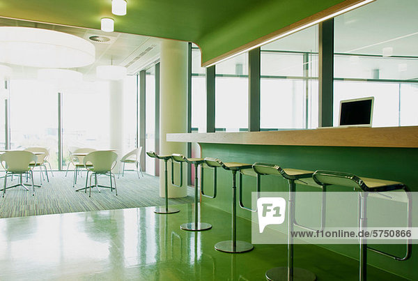 Stools and chairs in empty office block