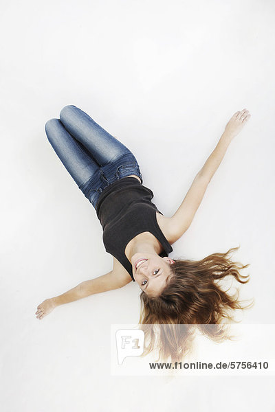 Young woman  lying on the floor