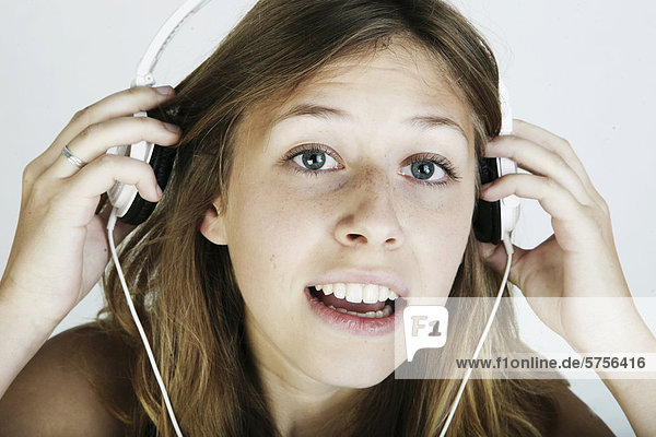 Young woman wearing headphones  portrait