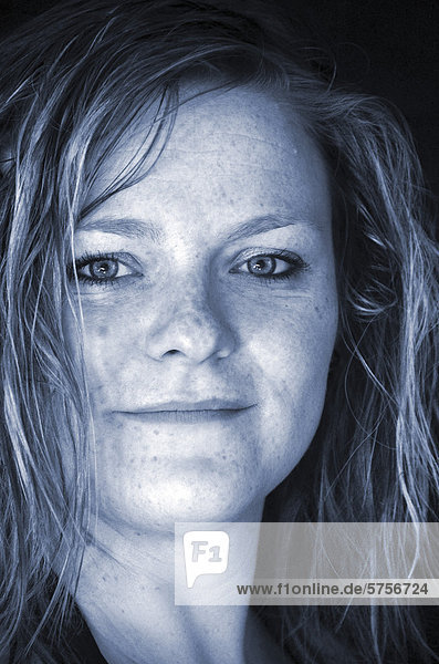 Young woman smiling wet hair portrait