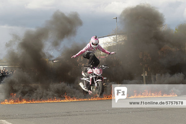 Motorcycle stunt show with stunt woman Mai-Lin Senf at the motorcycle Start-up Day of the ADAC  German automobile club  Koblenz  Rhineland-Palatinate  Germany  Europe