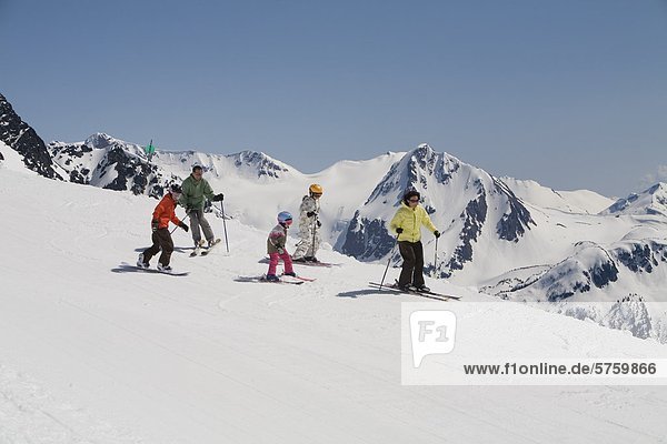 Family downhill skiing  Whistler  British Columbia  Canada.
