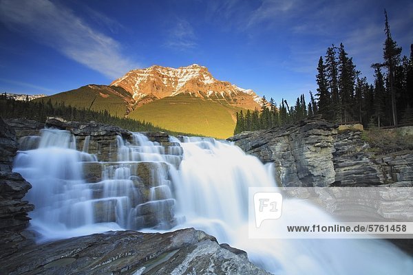 Sunset over Athabasca Falls with Mount Kerkeslin in the background  Jasper National Park  Alberta  Canada