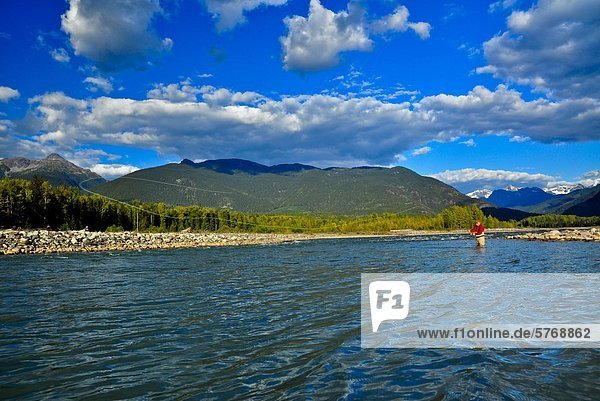 Man fly fishing  Copper River  British Columbia  Canada
