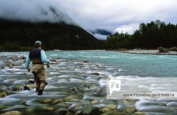 Man fly fishing  Dean River  British Columbia  Canada0