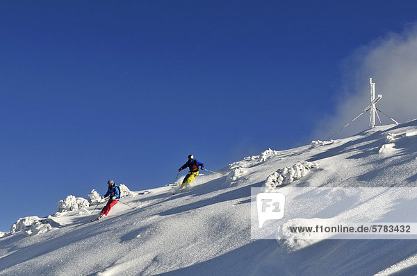 Skiers  Steinplatte skiing region  Reit im Winkl  Chiemgau  Bavaria  Germany  Europe
