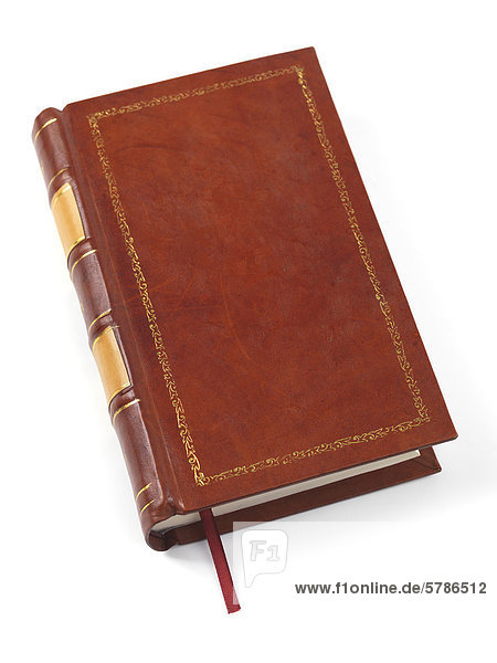 Gebundenes braunes Leder gebunden Buch isoliert auf weißem Hintergrund