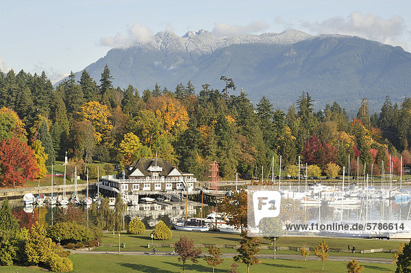 Vancouver Rowing Club  Devonian Harbour Park  Stanley Park  and North Shore Mountains in autumn  Vancouver  British Columbia  Canada