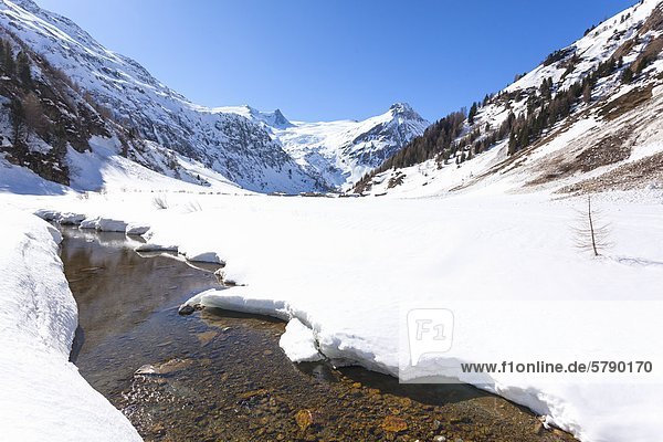 Snow-covered brook in the Venediger Group Tyrol Austria