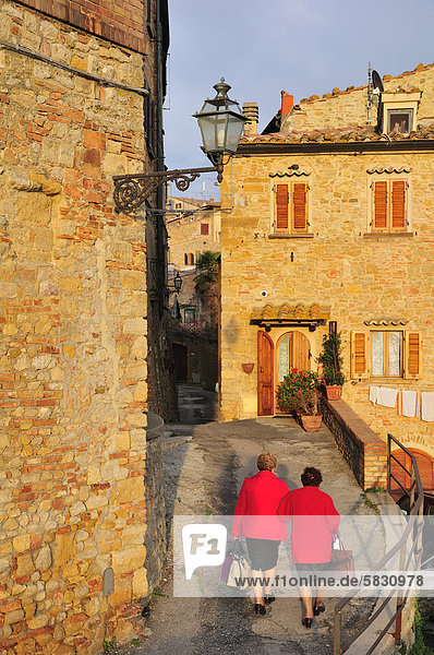 Old ladies in the historic district  Volterra  Tuscany  Italy  Europe