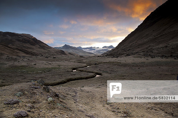 River meandering through a valley in the morning light Cordillera Huayhuash mountain range Andes Peru South America