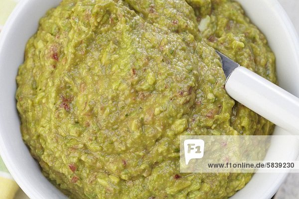 'Bowl of Guacamole with a Spoon