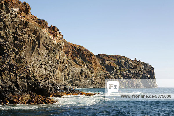 Steep volcanic cliffs  rock layers on the coast  San Benedicto Island  near Socorro  Revillagigedo Islands  archipelago  Mexico  eastern Pacific