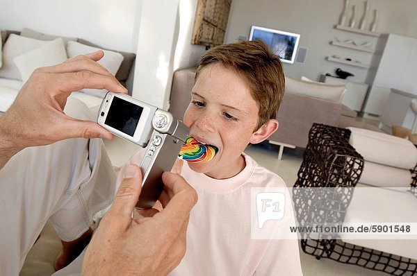 Handy Fotografie nehmen Sohn Mann Kurznachricht