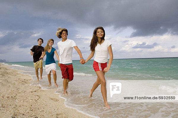 Jugendlicher  gehen  Strand  Junge - Person  2  Mädchen