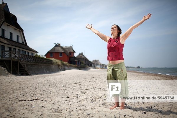 Woman on beach in Graswarder  Schleswig-Holstein  Germany