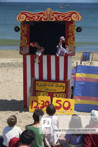 Punch & Judy show on the beach at Swanage  Dorset  England  United Kingdom  Europe