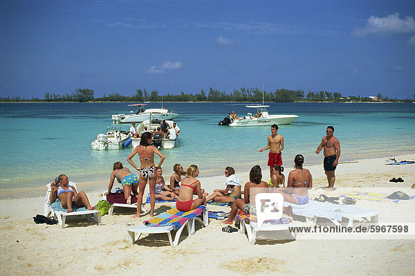 Group of tourists on beach  Western Esplanade  Nassau  Bahamas  West Indies  Central America