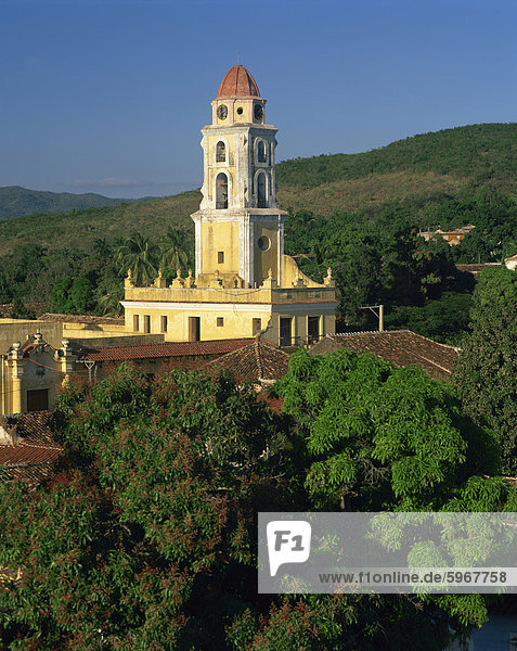 Tower of St. Francis of Assisi Convent church in the Old town  and hills behind at Trinidad  Cuba  West Indies  Caribbean  Central America