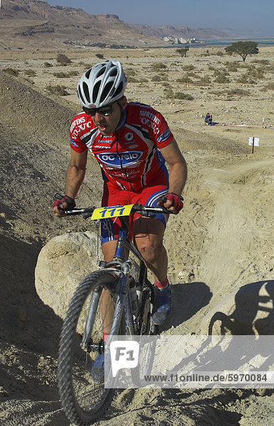 Teenage competitior in the Mount Sodom International Mountain Bike Race  Dead Sea area  Israel  Middle East