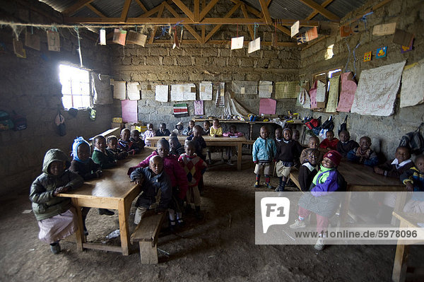 Nursery class in dirt floored classroom  St. Peter's Huruma Primary School  Olkalou  Rift Valley  Kenya  East Africa  Africa