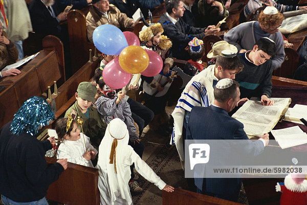 Reading of Esther Megila during the Purim Festival  Israel  Middle East