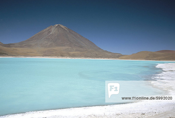 Laguna Verde with mineral flat margin and Volcan Licancabur  5960m  Southwest Highlands  Bolivia  South America