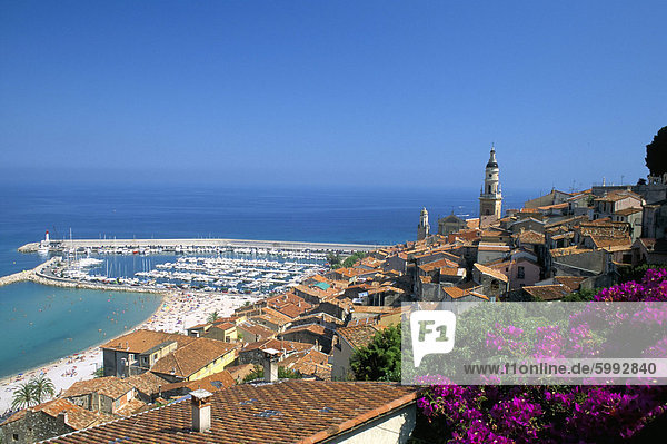 View across old town rooftops to harbour Menton Alpes-Maritimes Cote d'Azur Provence French Riviera France Mediterranean Europe