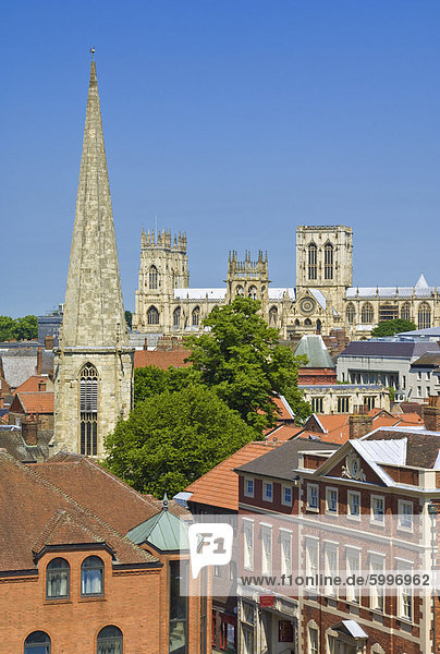 York Minster  northern Europe's largest Gothic cathedral  the spire of St Mary's church  and the skyline of the city of York  Yorkshire  England  United Kingdom  Europe