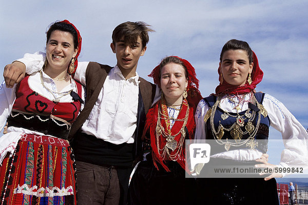 Four people in traditional costume  Festa de Santo Antonio (Lisbon Festival)  Lisbon  Portugal  Europe