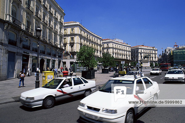 Traffic moves around square  Puerta del Sol  Madrid  Spain  Europe
