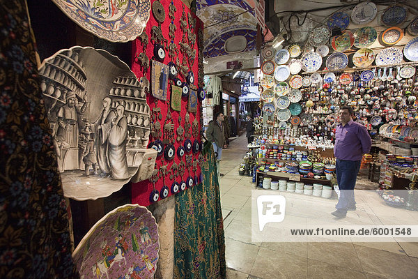 Shop seller in the underground Grand Bazaar  Istanbul  Turkey  Europe