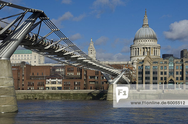 The Dome of St. Pauls Cathedral and Millennium Bridge over the River Thames  London  England  United Kingdom  Europe