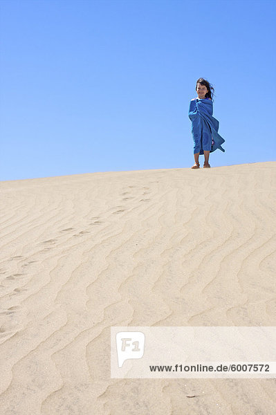 Young girl on the dunes  Maspalomas  Gran Canaria  Canary Islands  Spain  Europe