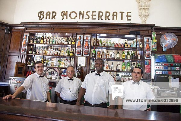 Bartenders and waiters at the Monserrate Bar in Central Havana  Havana  Cuba  West Indies  Central America