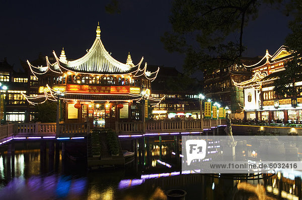 Yuyuan (Yu yuan) Garden Bazaar buildings founded by Ming dynasty Pan family illuminated in the Old Chinese city district  Shanghai  China  Asia
