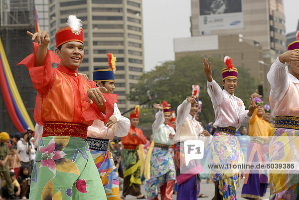 Malay male dancer wearing traditional dress at celebrations of Kuala Lumpur City Day Commemoration  Merdeka Square  Kuala Lumpur  Malaysia  Southeast Asia  Asia