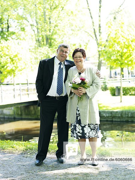 Portrait of senior couple celebrating wedding