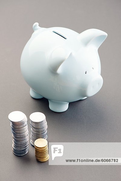Münzen und eine Ersparnis-box