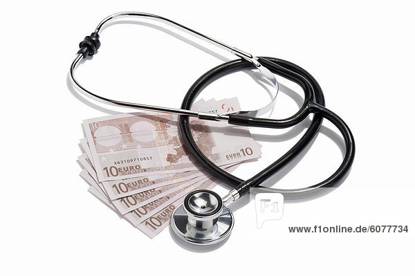 A doctors stethoscope and Euro notes