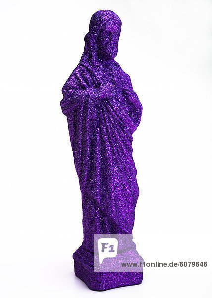 Eine lila Jesus Figur