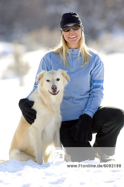 Woman hanging out with dog in Salt Lake City  Utah.