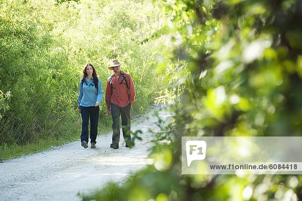 A couple takes a walk in Everglades National Park  Florida.