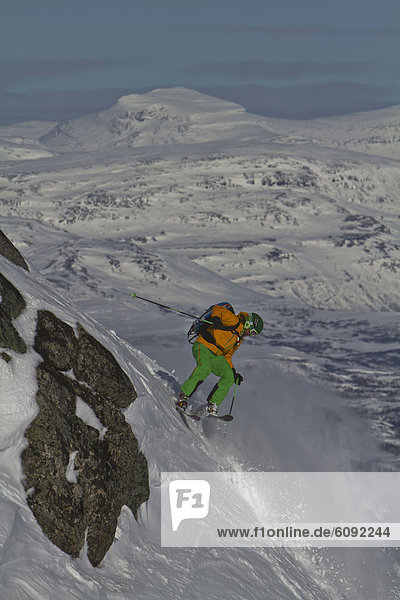 Sweden  Skier skiing steep downhill