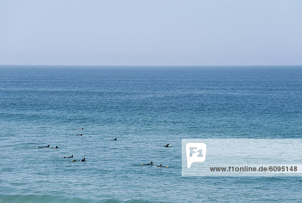 Portugal  Algarve  Sagres  Surfer surfing on Atlantic ocean