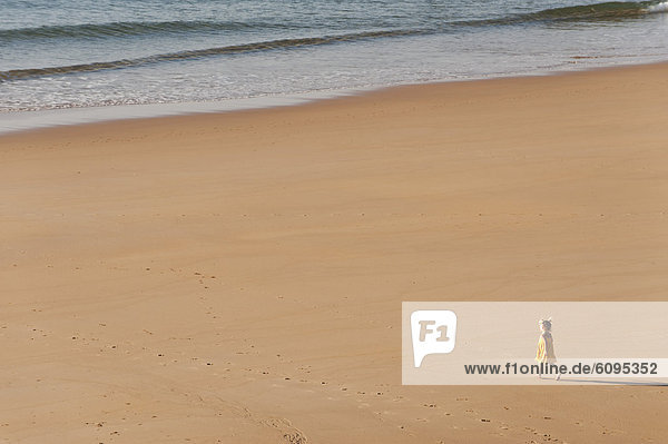 Portugal  Girl walking on beach