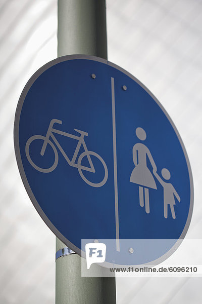 Germany  North Westphalia  Neuss  Bicycle lane and crossing sign  close up
