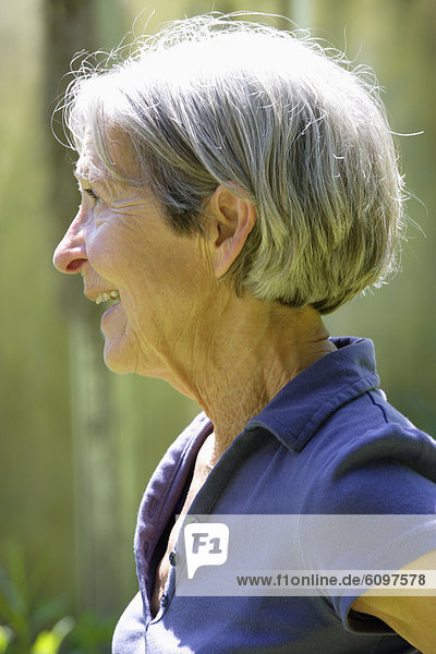 Senior woman looking away  smiling