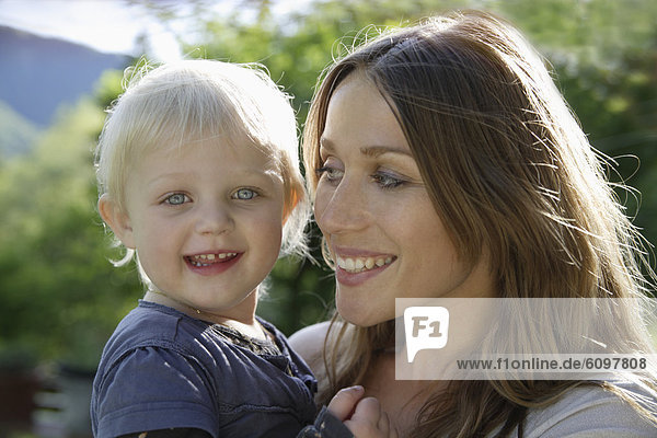 Germany  Bavaria  Mother and daughter smiling